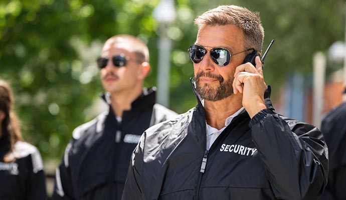 Professional security team patrolling outdoors