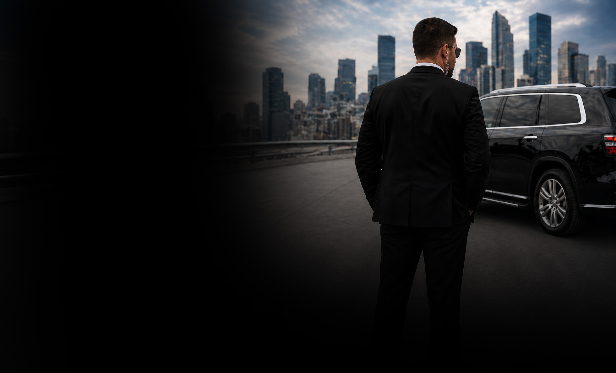 Security professional standing near a vehicle