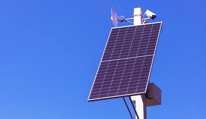 Solar-powered security camera on a pole